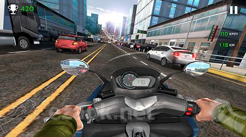 Moto rider in traffic
